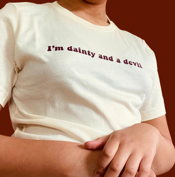 “I’m dainty and a devil” dark red on tan t-shirt