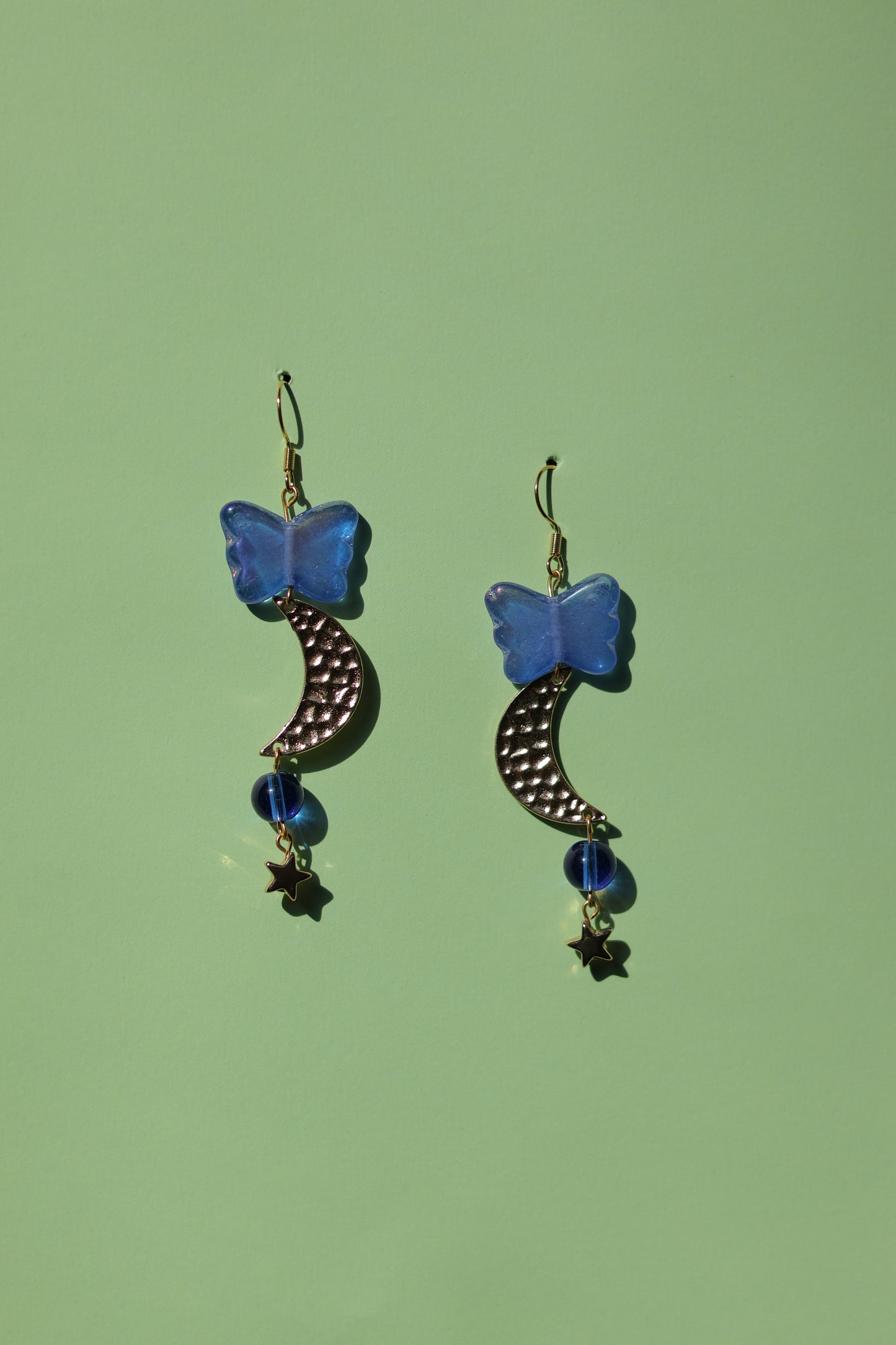 Midnight beauty’s glass butterfly earrings