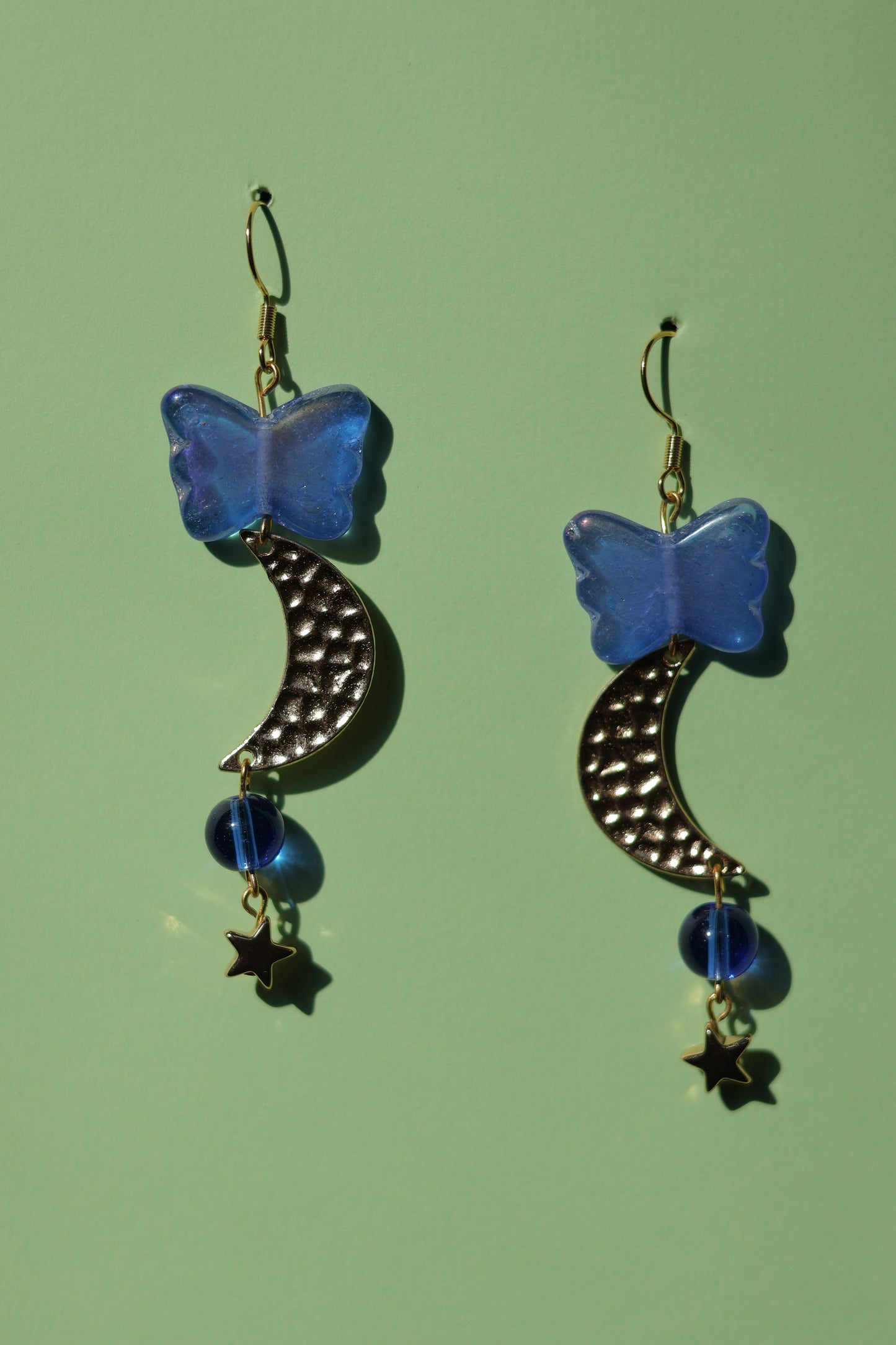Midnight beauty’s glass butterfly earrings