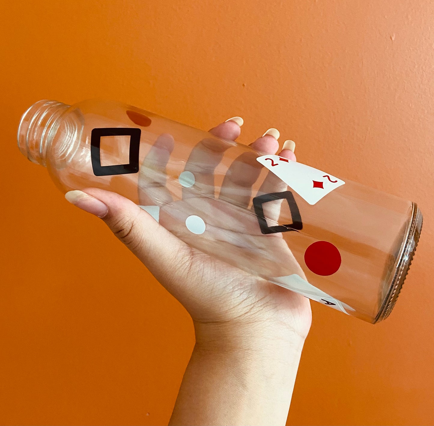 Playing card glass water bottle