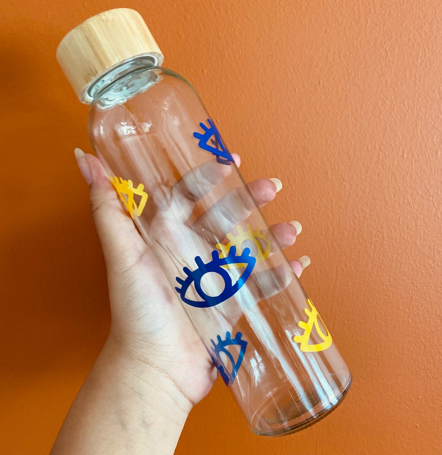 Navy and yellow eye glass water bottle