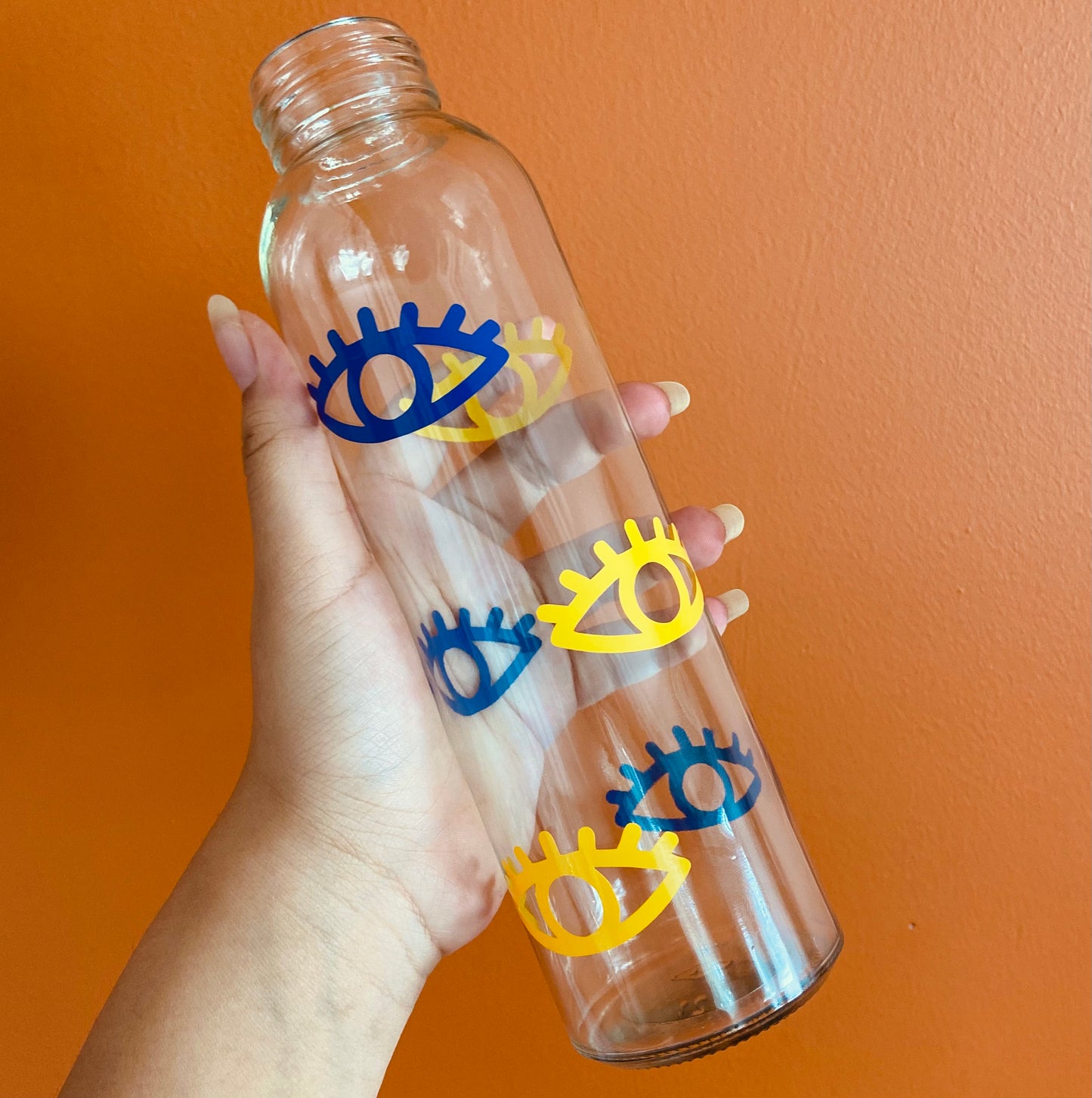 Navy and yellow eye glass water bottle