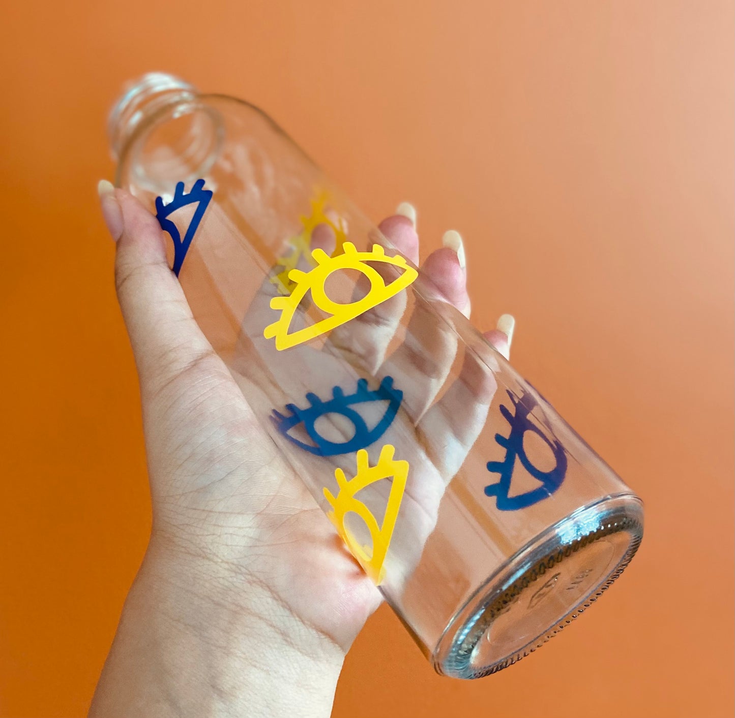 Navy and yellow eye glass water bottle