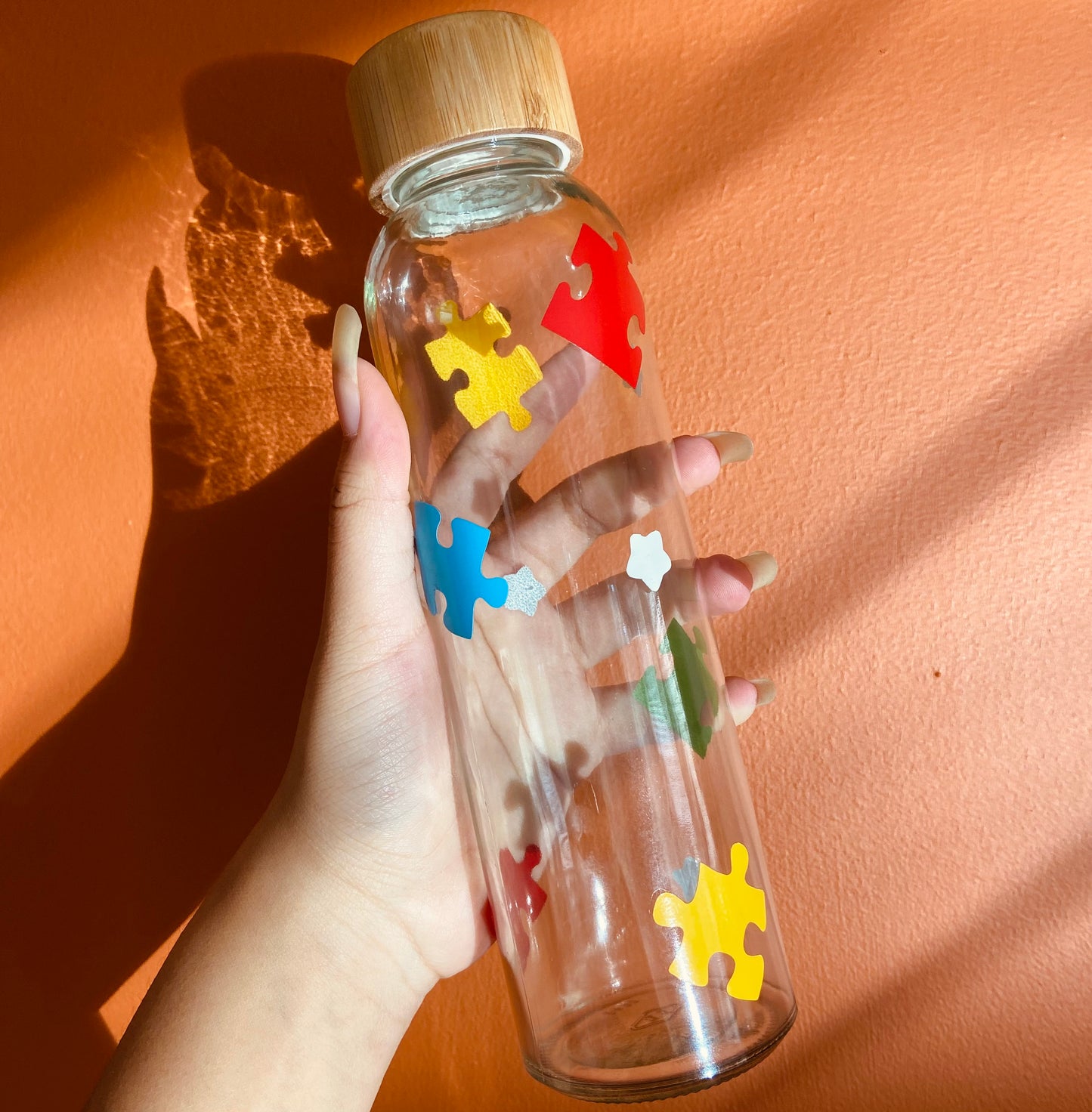 Puzzle piece glass water bottle