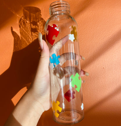 Puzzle piece glass water bottle