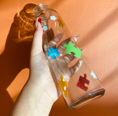 Puzzle piece glass water bottle