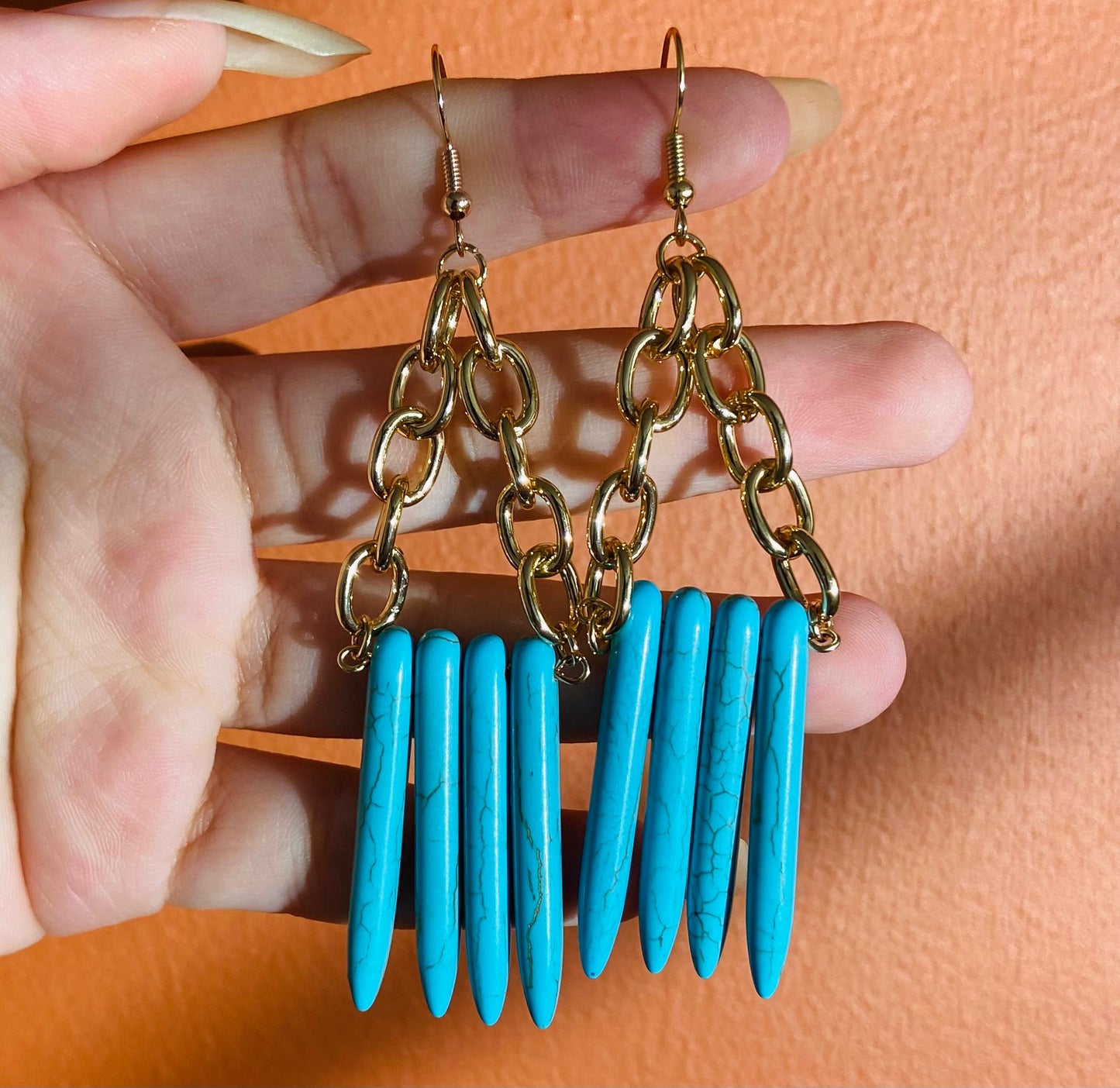 Reconstituted turquoise spike earrings