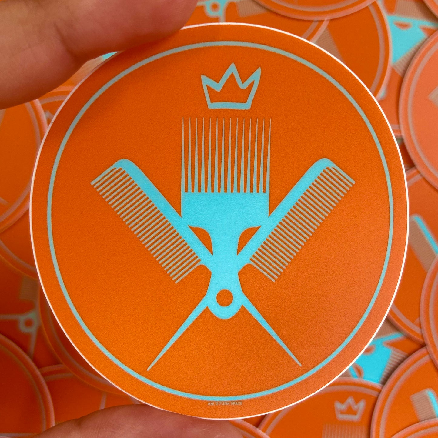 Orange and cyan hair picks sticker