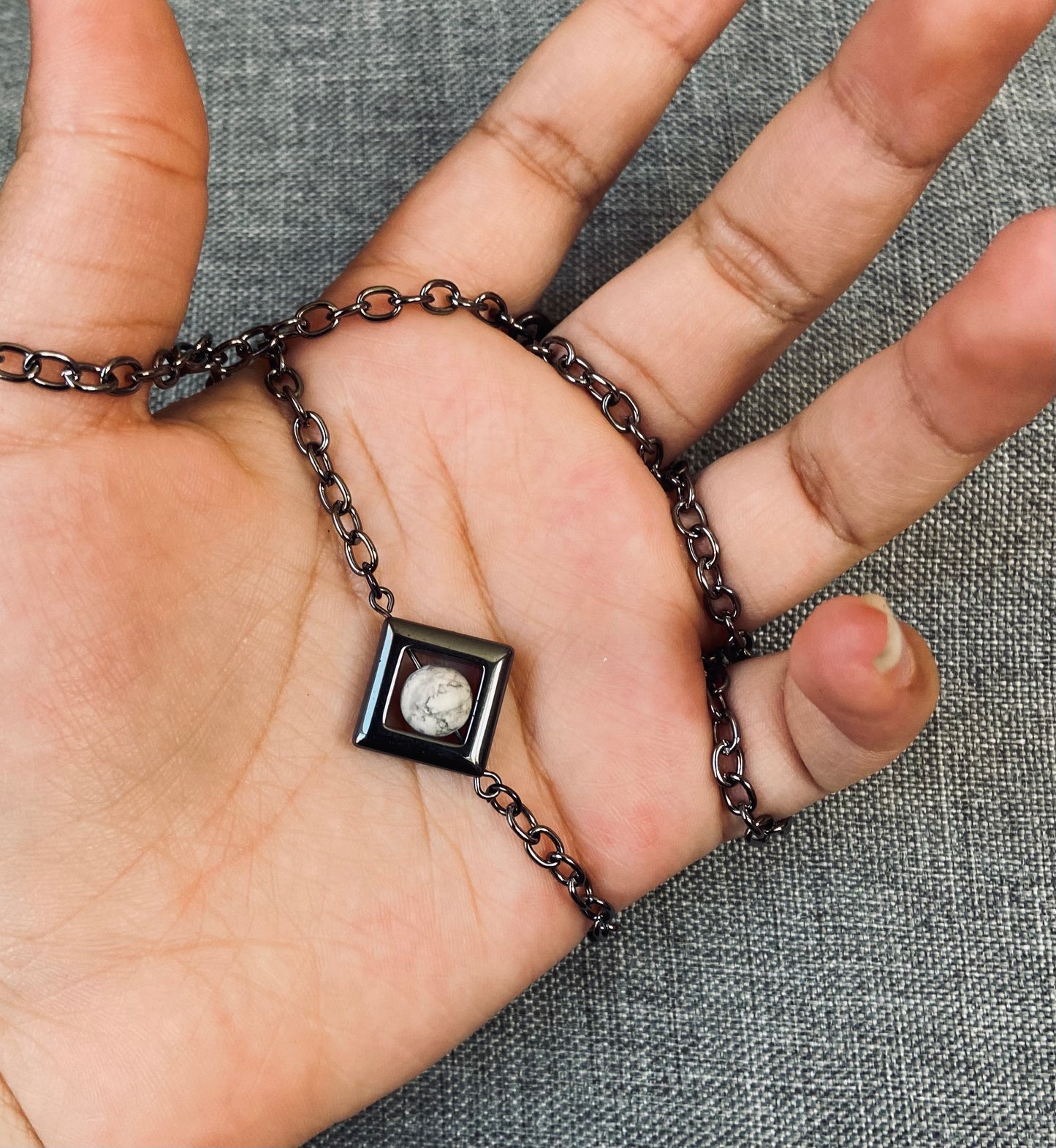 Marble and hematite fidget necklace